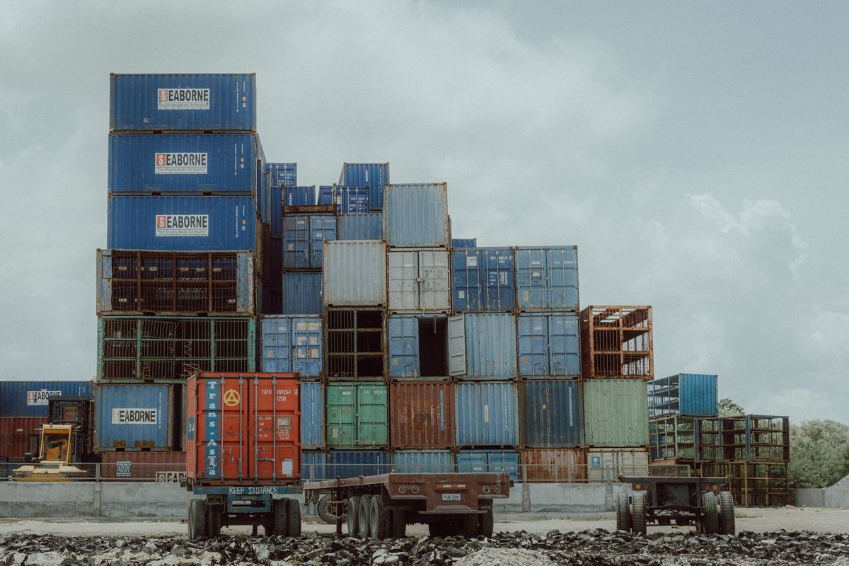 Stacked shipping containers at a freight yard